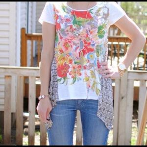 Anthropologie Cotton top with handkerchief sides.